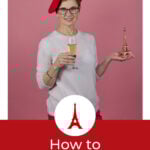 Andi in Quince sweater and beret with glass of chamgne and eiffel tower PIN