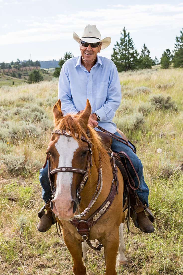 Cowboy horseback riding Bitter Creek near Billings Montana_Photo credit Emily Sierra