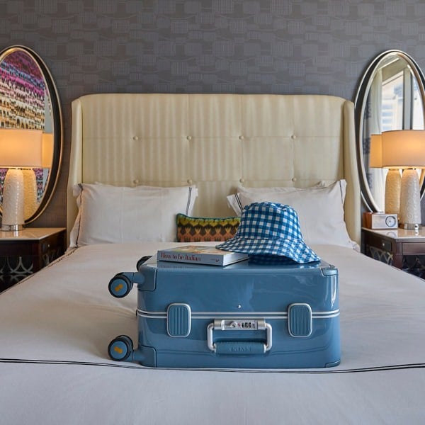 luggage on a bed