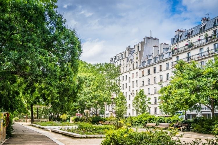 spring garden in paris with buildings