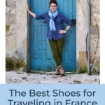 woman standing by a blue door